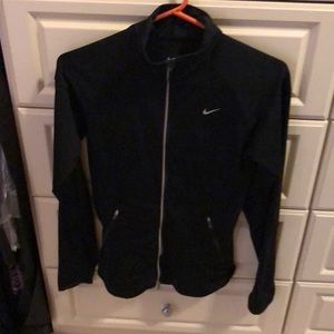 Women’s Nike zip up jacket.